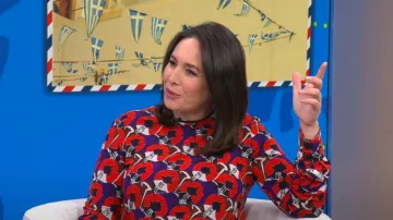 Chemisier Marni en crêpe imprimé floral porté par Nancy Cordes tel qu’on le voit dans CBS Mornings le 5 mars 2024