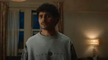 Nike Vin­tage Town Lon­don Sweat­shirt worn by Kash (Bilal Hasna) as seen in Extraordinary (S02E01)