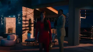 Zeynep Arcay Asym­met­ric Knit Mi­di Dress worn by Nadia Morales (Eva De Dominici) as seen in The Cleaning Lady (S03E01)