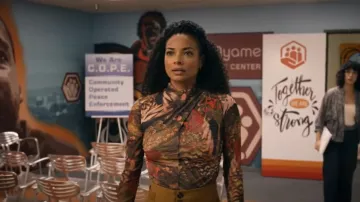 All Saints Tia Graph­ic Print Mesh Top worn by Nichelle Carmichael (Rochelle Aytes) as seen in S.W.A.T. (S07E05)