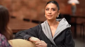 Alaia Archetypes Hooded Denim And Stretch-Lace Bodysuit worn by Shay Mitchell as seen in Today on March 11, 2024