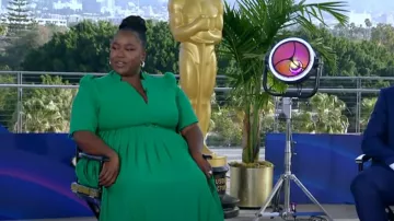 Karen Millen Tailored Structured Crepe Forever Pleat Belted Midi Dress worn by Kelley L. Carter as seen in Good Morning America on March 11, 2024