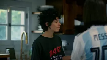D.A.R.E To Resist Drugs & Violence Tshirt worn by Nico (Roberta Colindrez) as seen in Vida (S02E07)