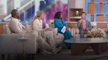 Nike Air Jordan 1 Mid SE Taupe Haze Sneakers worn by Akbar Gbaja-Biamila as seen in The Talk on March 11, 2024