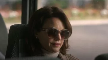 Celine Round Sun­glass­es worn by Grace Gordon Greene (Carla Gugino) as seen in The Girls on the Bus (S01E01)