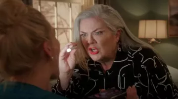 Eloquii Print­ed But­ton Down worn by Gloria McManus (Paula Pell) as seen in Girls5eva (S03E03)