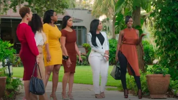 Bcbgmaxazria Asym­met­ric Top worn by Karla Giorgio as seen in Selling Tampa (S01E01)