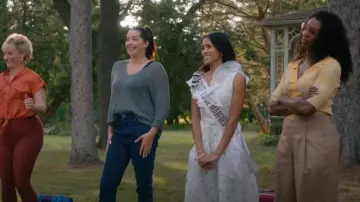 Remain Birger Christensen Joy Striped Ribbed-knit Polo Shirt In Yellow worn by Sloane Mitchell (Enuka Okuma) as seen in Workin' Moms (S06E10)