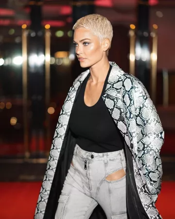 The Apparis snakeskin coat worn by Caroline Receveur on her Instagram account@carolinereceveur