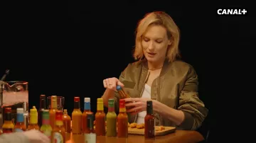 The khaki bomber jacket worn by Anna Girardot on the show Hot Ones