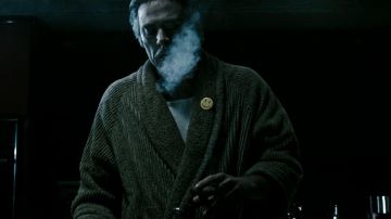 La insignia de Smiley en Watchmen The Guardians