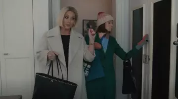 Valentino Rock­stud Grainy Calf­skin Tote Bag worn by Joann (Jane Krakowski) as seen in Elsbeth (S01E02)