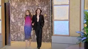 Dolce & Gabbana Metallic Leather Platform Sandals worn by Elizabeth Hurley as seen in Tamron Hall Show on April 5, 2024