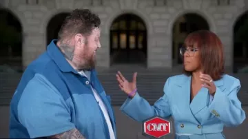 Aknvas Denim Stone Cropped Blazer worn by Gayle King as seen in CBS Mornings on April 8, 2024