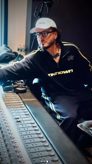 Unknown London Navy & Yellow 'UN' Trackpants worn by J Balvin on his Instagram account @jbalvin