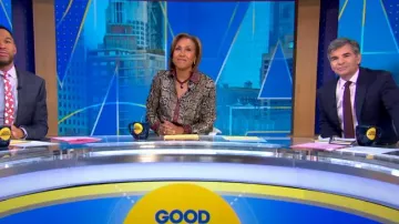 Victoria Beckham Slim Snake-Printed Silk Shirt worn by Robin Roberts as seen in Good Morning America on April 11, 2024
