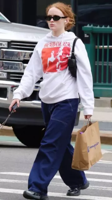 Miu Miu Nappa Leather Pocket Bag worn by Sadie Sink in New York City on April 10, 2024