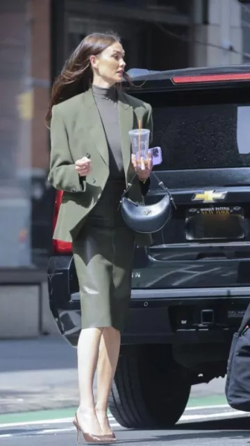 Prada Arque Leather Shoulder Bag worn by  Karlie Kloss in New York City on April 9, 2024