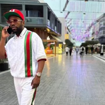 Gucci White Terry Vertical Stripe Shirt worn by Floyd Mayweather on the Instagram account @floydmayweather