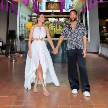 Cult Gaia Thera Flocked Georgette Maxi Dress worn by  Chrissy Teigen on her Instagram Story on April 4, 2024