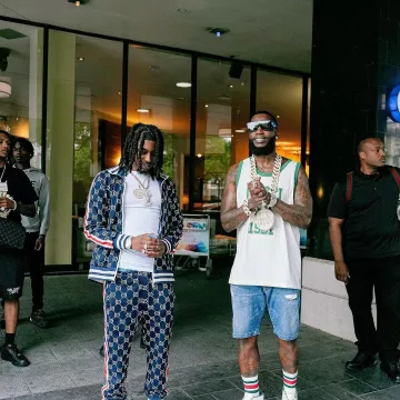 Camiseta sin mangas Gucci White & Green 'Gucci 1921' usada por Gucci Mane en la cuenta de Instagram @laflare1017