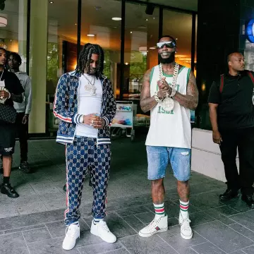 Gucci White High-Top 'Tennis 1977' Sneakers worn by Gucci Mane on the Instagram account @laflare1017