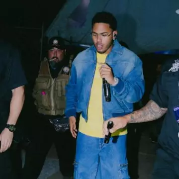 Givenchy Washed Blue Denim Bomber Jacket worn by Myke Towers on the Instagram account @myketowers