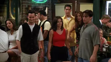 Chandler Bing Outfits: Matthew Perry is wearing Suit Vest in Friends TV series season 3, episode 1