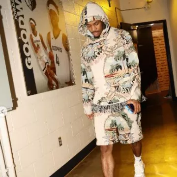 Amiri White Cherub Palm Tapestry Shorts worn by Temetrius Morant on the Instagram account @memgrizz
