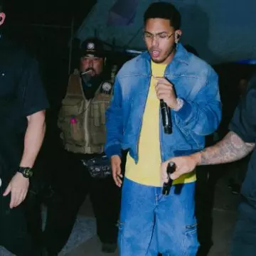 Givenchy Washed Blue Denim Bomber Jacket worn by Myke Towers on the Instagram account @myketowers