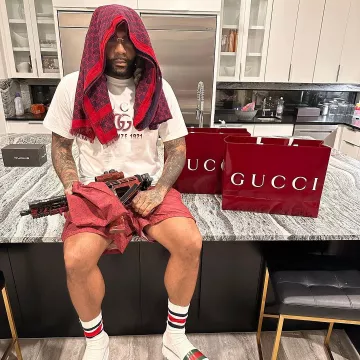 Gucci Dark Red-GG Swim Shorts worn by Money Man on the Instagram account @moneyman