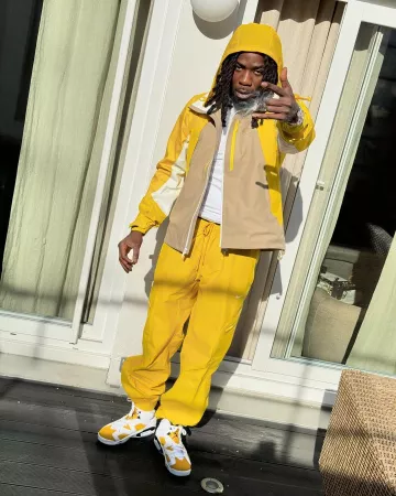 Nike x Nocta L'Art Biege & Yellow Hooded Jacket worn by Gazo on the Instagram account @gazo_officiel