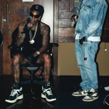 Balenciaga Black Gotham Cat Sunglasses worn by Wiz Khalifa on the Instagram account @wizkhalifa