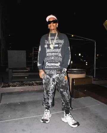 Balenciaga Black DIY Metal Logos Long Sleeve T Shirt worn by Wiz Khalifa on the Instagram account @wizkhalifa