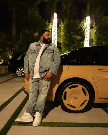 Chaqueta vaquera Louis Vuitton Light Wash Blue Damier usada por DJ Khaled en la cuenta de Instagram @djkhaled