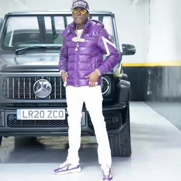 Pandemonium Purple 'PANDE' Trucker Hat worn by Bobby Shmurda on the Instagram account @itsbobbyshmurda