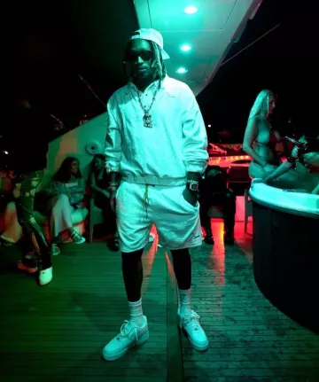 Rhude White Terry Cotton Rugby Polo worn by Future on the Instagram account @plutohendrixxvault