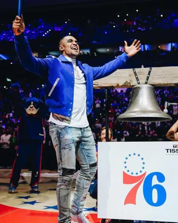 Amiri Royal Blue 'Western' Varsity Jacket worn by Jalen Hurts on the Instagram account @philadelphiaeagles