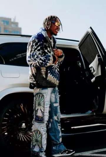 Who Decides War Blue Stained Glass Window Final Destination Jeans worn by Justin Jefferson on the Instagram account @jjettas2