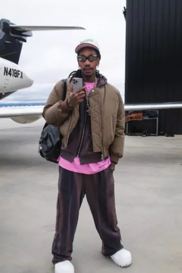 Balenciaga Bronze Warped Fennec Oval Sunglasses worn by Wiz Khalifa on the Instagram account @wizkhalifa