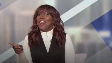 Reformation Oakley Peplum Vest worn by Sheryl Underwood as seen in The Talk on April 23, 2024