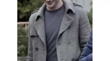 Twilight Movie Outfits: Robert Pattinson is wearing Grey Zip Jacket to portray Edward Cullen