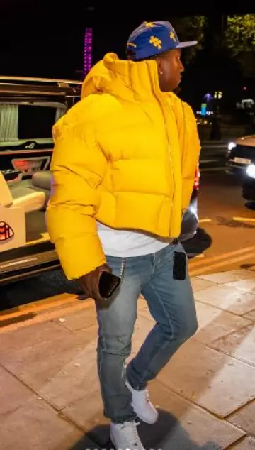 Entire Studios Citrine Yellow 'MML' Puffer Jacket worn by Deebo Samuel on the Instagram account @1deebosr