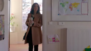 Clementine's (Lucie Lucas) beige mid-length coat in Clem (Season 9 Episode 6)