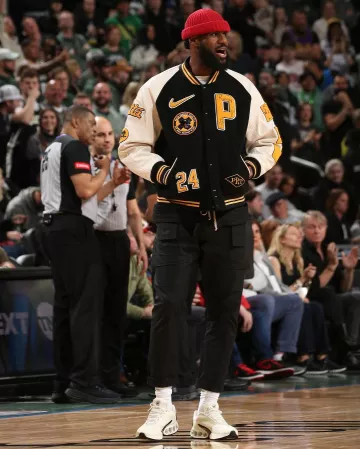 Nike x Patta Black, White, & Yellow Varsity Jacket worn by LeBron James on the Instagram account @leaguefits