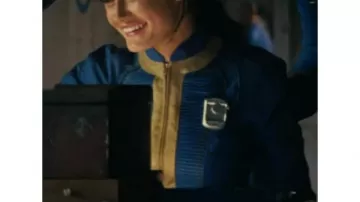 Fallout TV series outfits: Lucy (Ella Purnell) is wearing blue costume cosplay in season 1