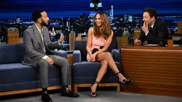 John Legend Outfits: he is wearing a grey suit in The Tonight Show TV show