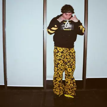 Marni x Carhartt WIP Black & Yellow Pants worn by Ohgeesy on the Instagram account @ohgeesy