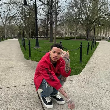 Balenciaga Red Stencil Logo Zip Hoodie worn by Lil Mosey on the Instagram account @lilmosey