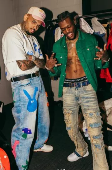 Louis Vuitton Black & Gold Crystal 'LV Dynasty' Belt worn by Chris Brown on the Instagram account @chrisbrownofficial